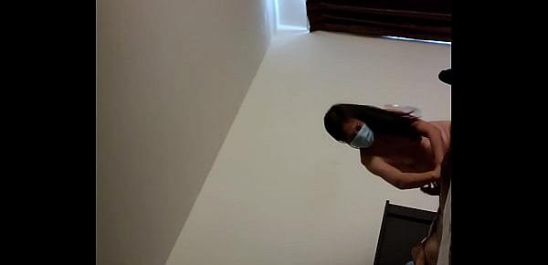  Mask wearing Chinese escort in hotel